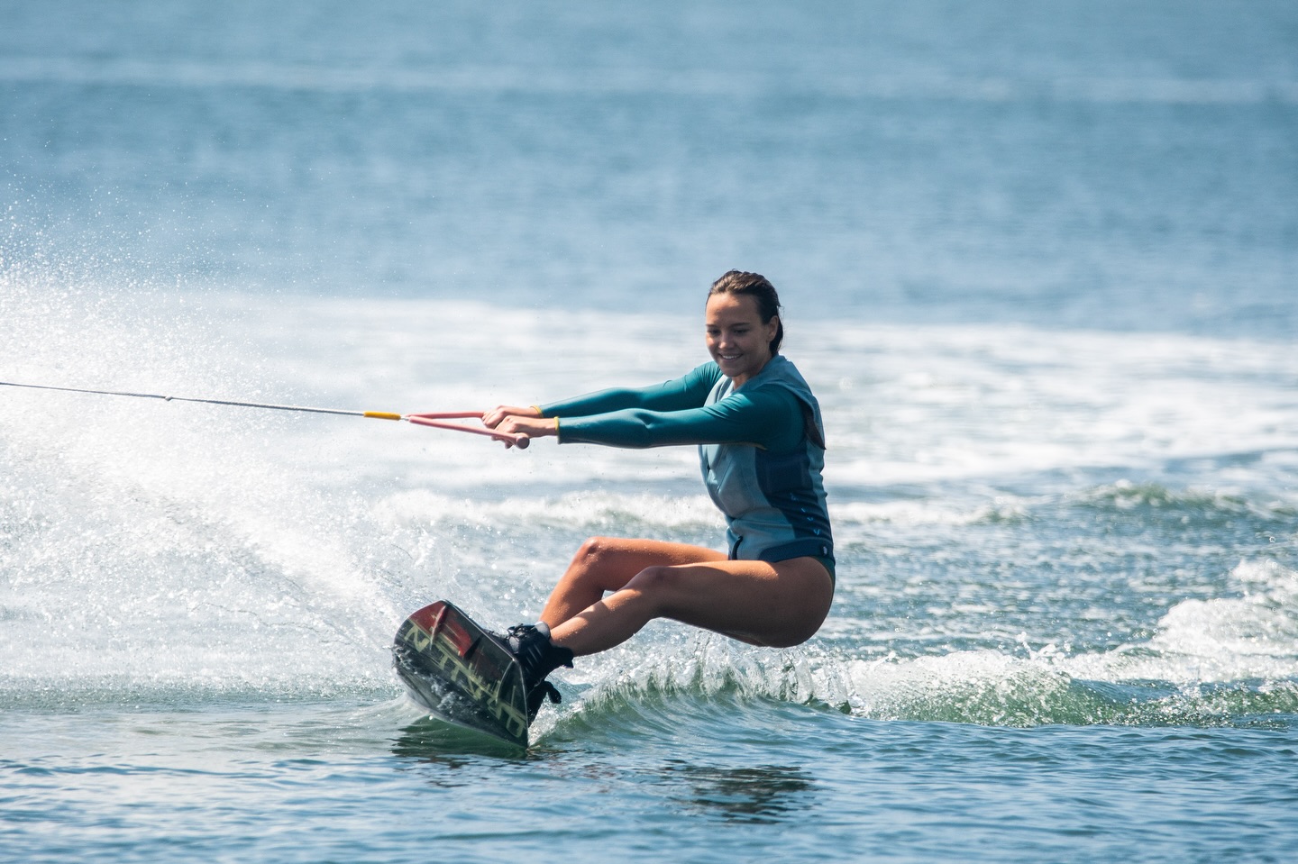 Wakesurfing action on calm sheltered waters near the Atlantic coast